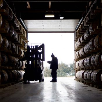 Whiskey barrels in storage